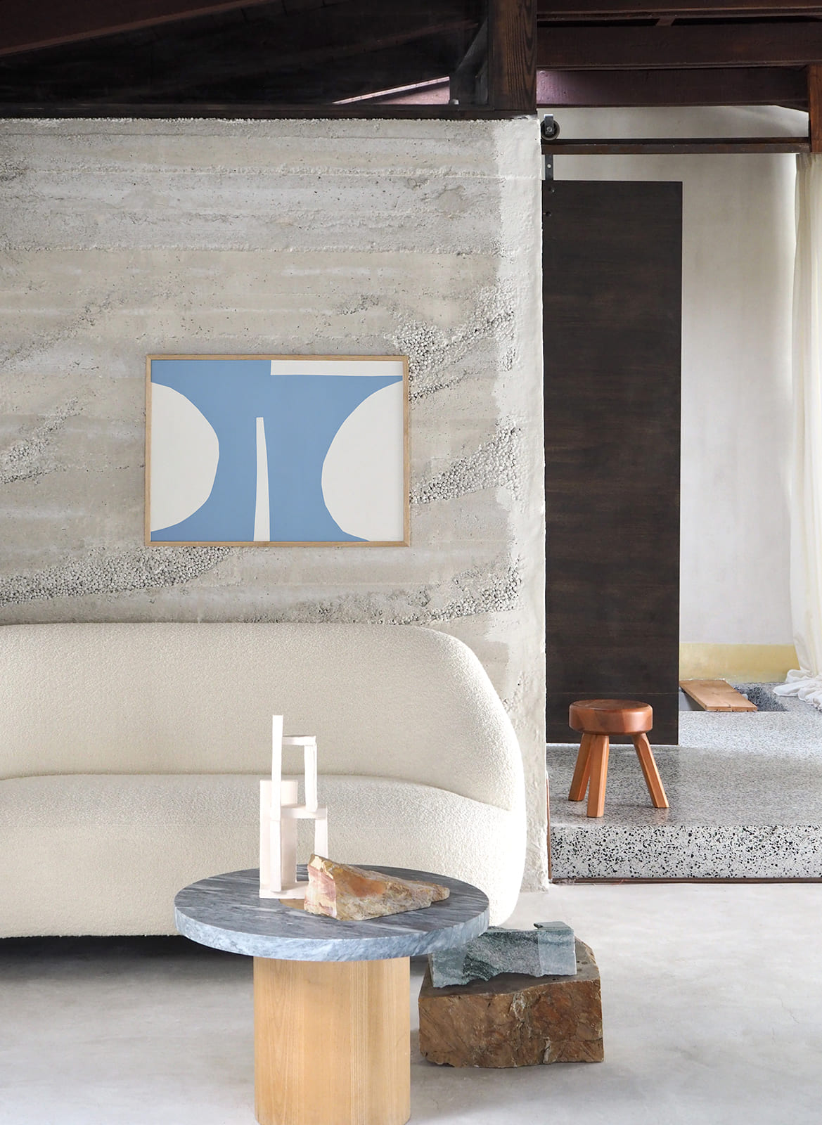 Framed abstract poster hanging in a living room by Atelier Cph