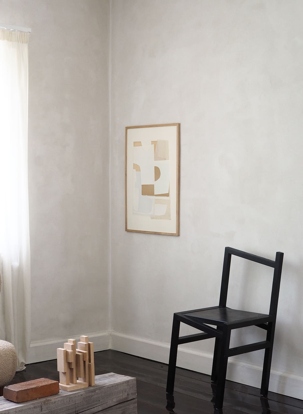  Framed minimalistic poster hanging in a living room by Atelier Cph