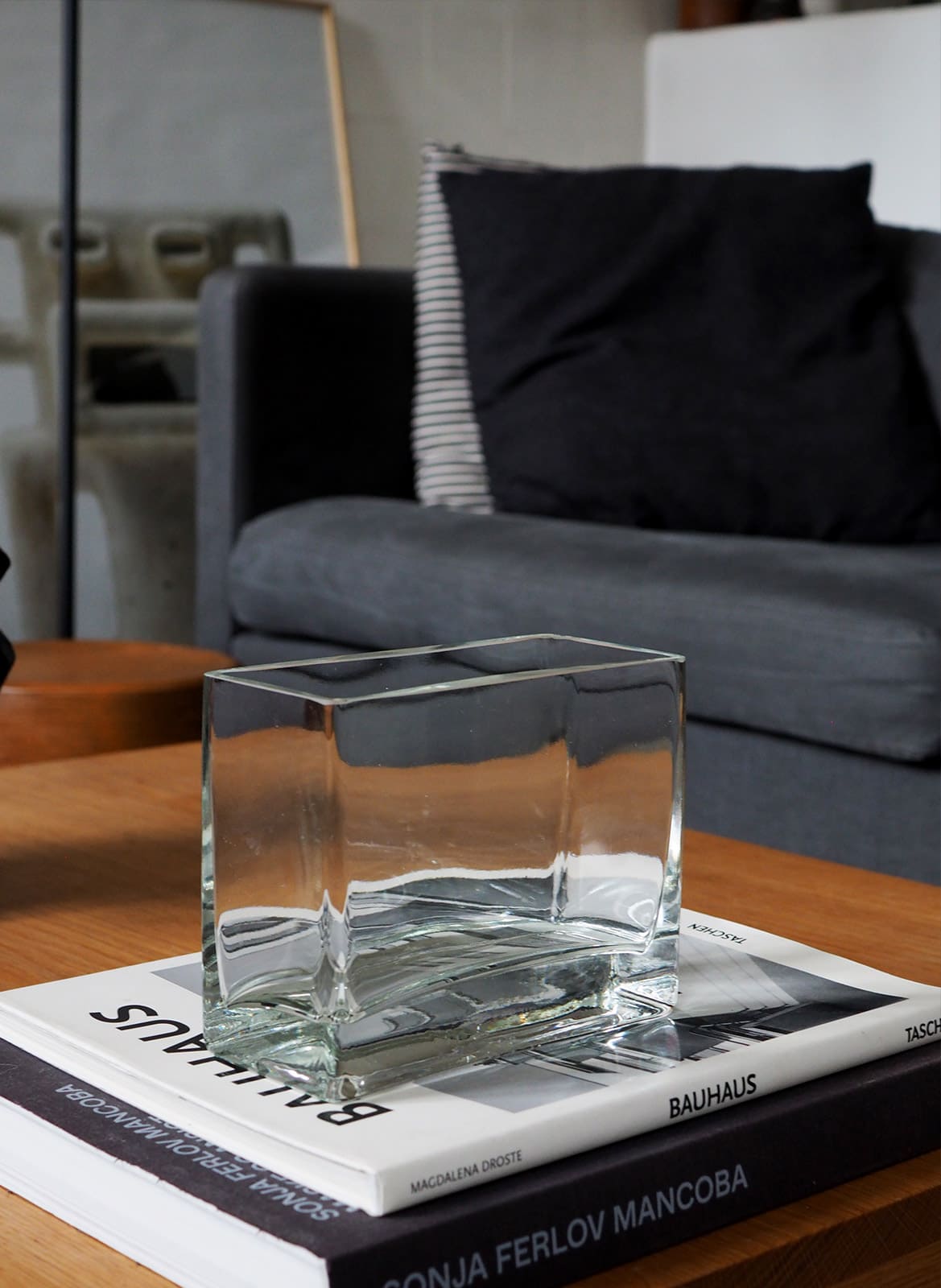 Minimalistic rectangle glass vase standing on a table