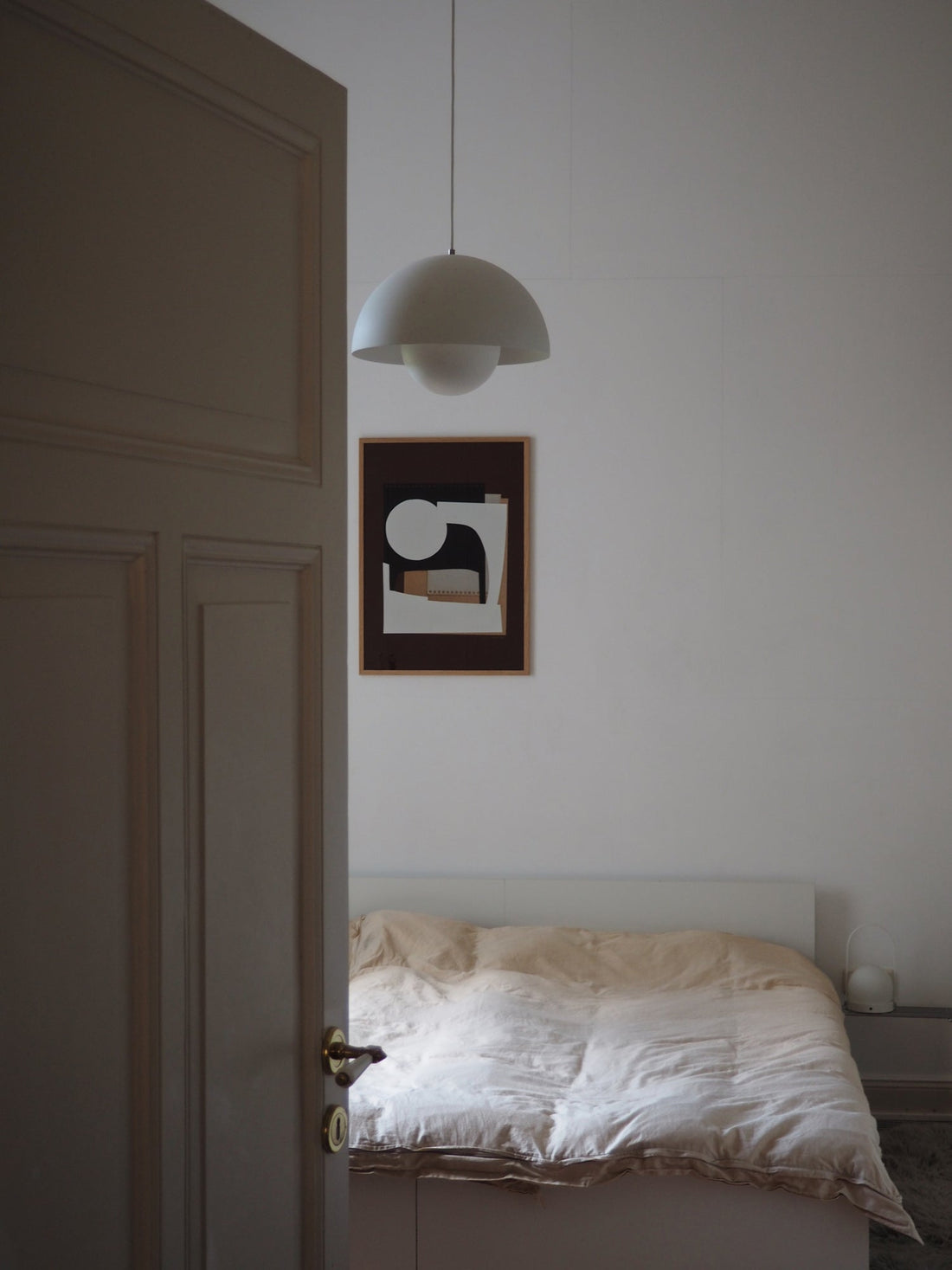 Atelier Cph poster displayed in Scandinavian styled bedroom