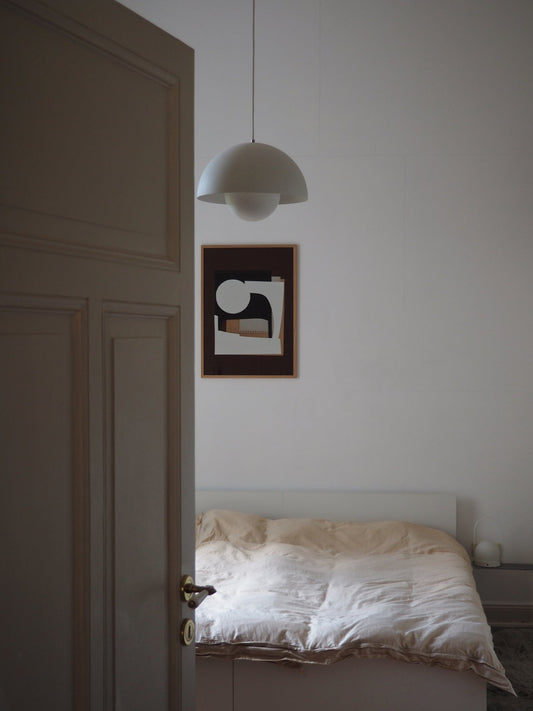 Atelier Cph poster displayed in Scandinavian styled bedroom