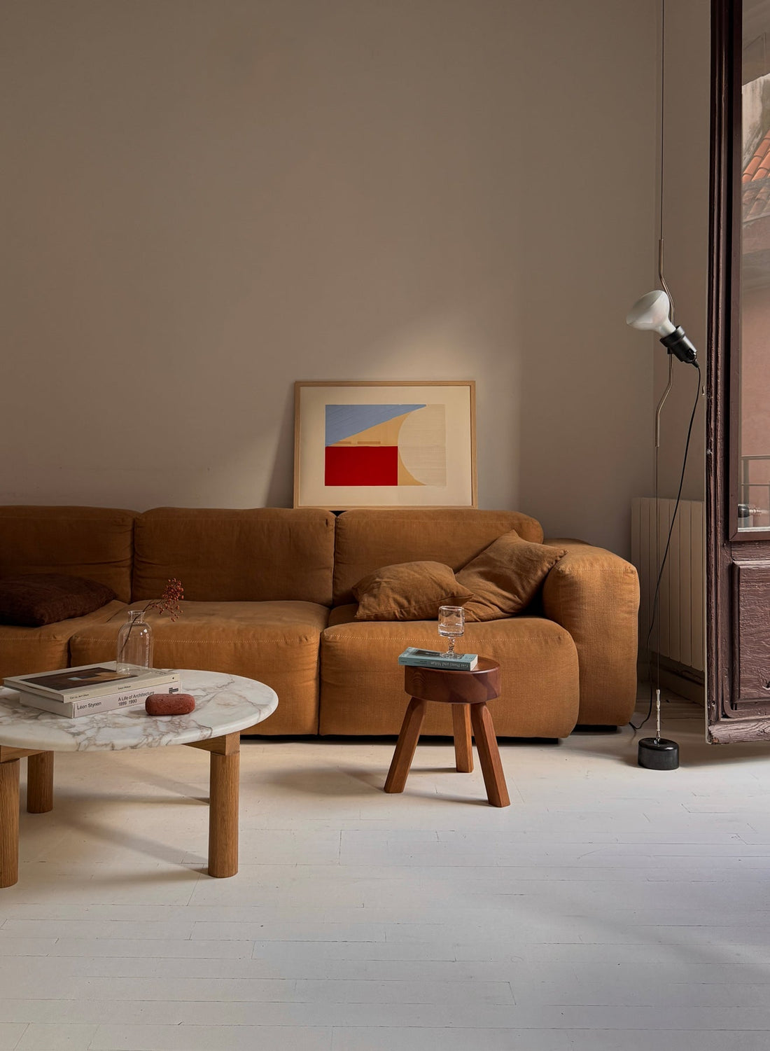 Atelier Cph poster displayed in real living room environment