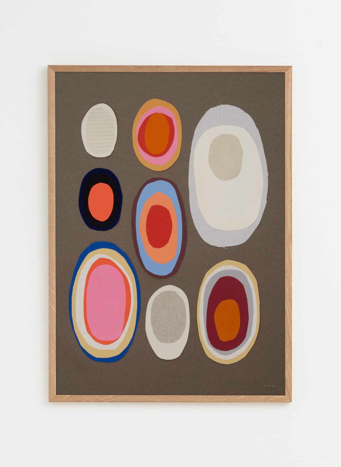 Brown poster with round forms made by Atelier Cph