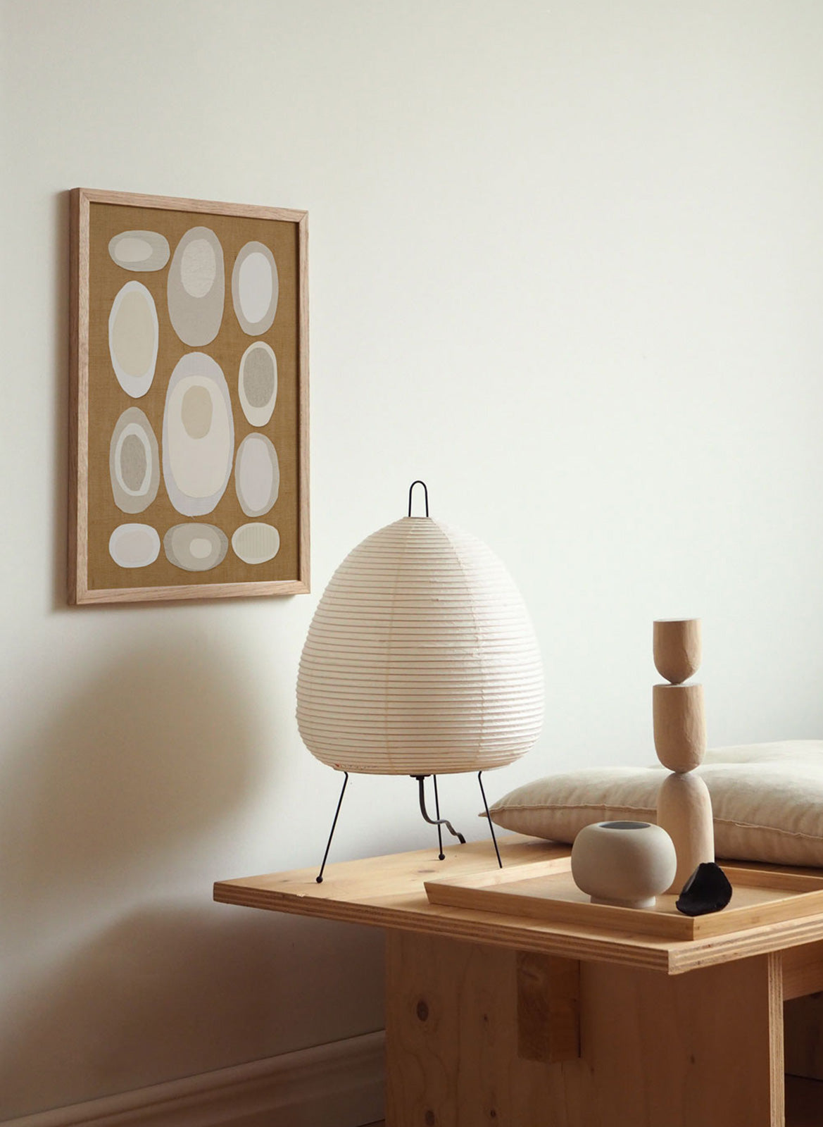  Framed minimalistic poster hanging in a living room by Atelier Cph