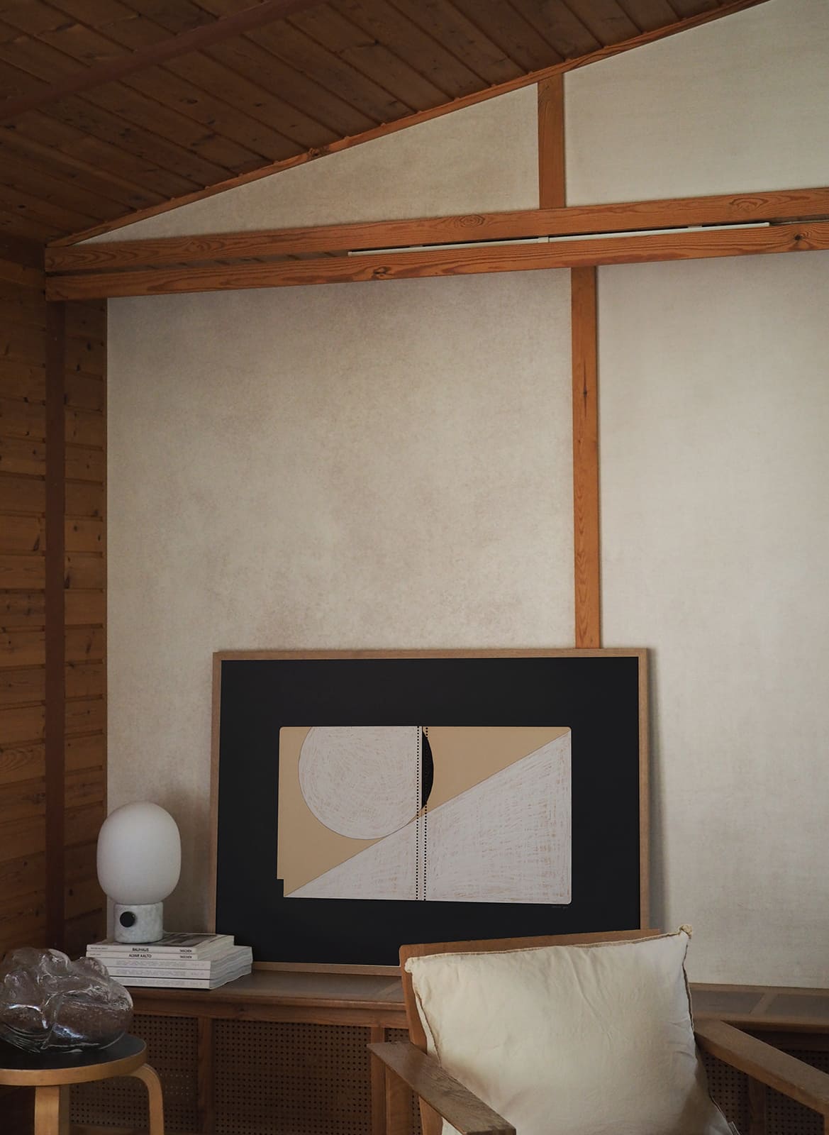  Framed minimalistic poster standing in a living room by Atelier Cph
