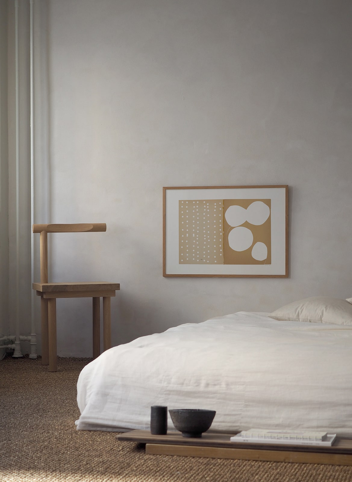  Framed poster with circles hanging in bedroom by Atelier Cph