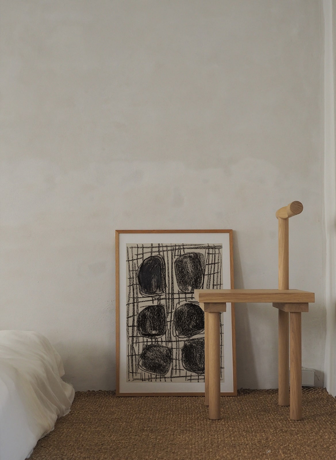 Framed poster with circles standing in bedroom by Atelier Cph