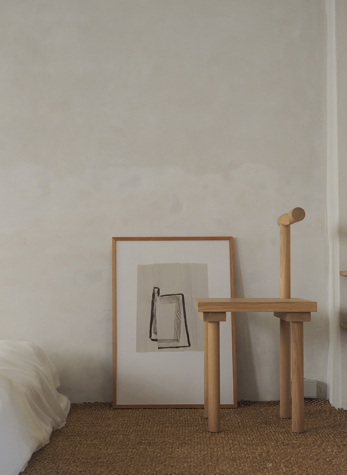  Framed minimalistic poster standing in bedroom by Atelier Cph