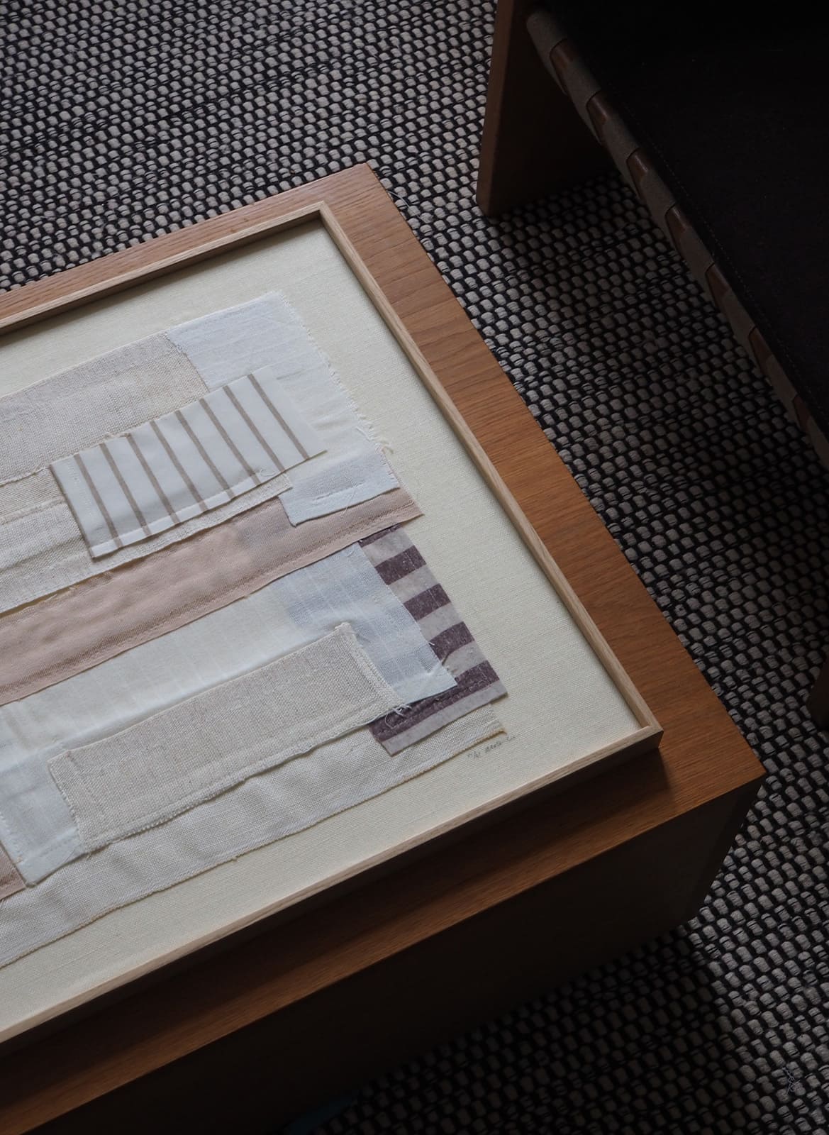 Framed limited edition art work made from stripped fabric pieces by Atelier Cph