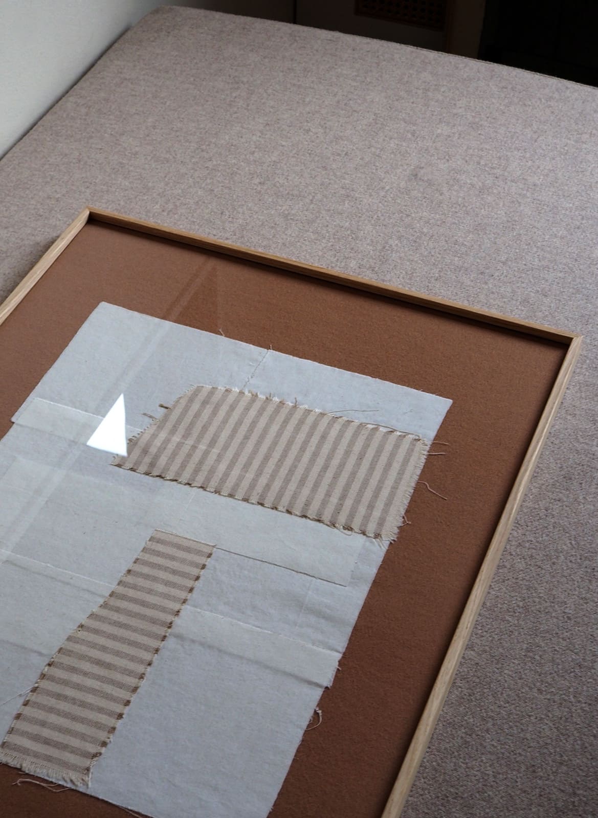  Framed fabric collage in brown and white, limited edition made by Atelier Cph